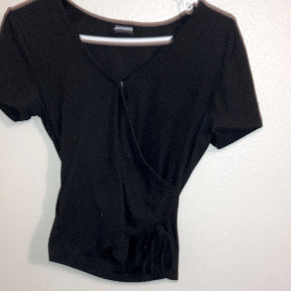 Black. Shirt with button n tie by hip